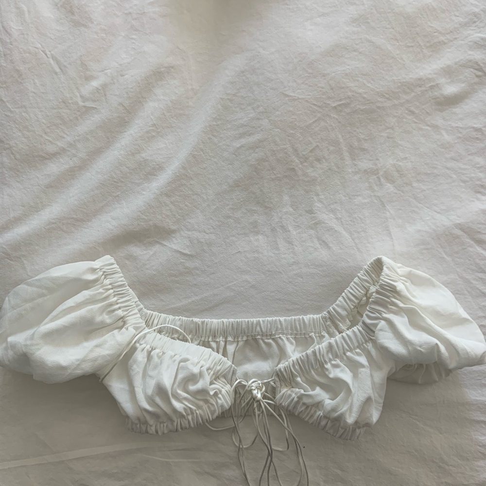 white puffy sleeved top